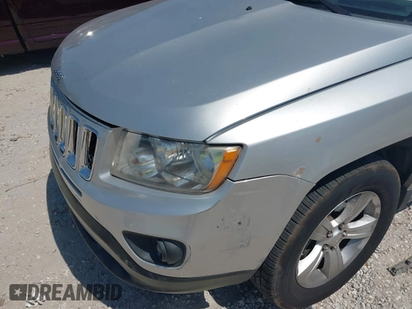 2012 Jeep Compass Sport with VIN 1C4NJCBA7CD660091, listed as a IAAI auction lot 42113038 with 123,181 mi miles. Bid and sale history available at carsss.com. Image 13.
