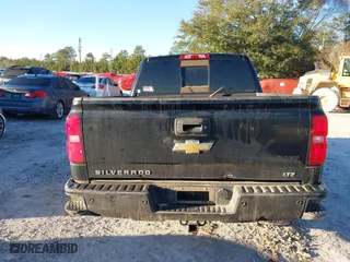 2015 Chevrolet Silverado 1500 LTZ with VIN 3GCUKSEJXFG489780, listed as a IAAI auction lot 41335608 with 140,972 mi miles. Bid and sale history available at carsss.com. Image 16.