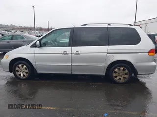 2004 Honda Odyssey EX-L with VIN 5FNRL18934B016420, listed as a IAAI auction lot 41473237 with 188,659 mi miles and . Bid and sale history available at DreamBid. Image 14.