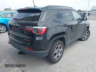 2022 Jeep Compass Trailhawk with VIN 3C4NJDDB8NT107992, listed as a IAAI auction lot 42116531 with 48,787 mi miles and . Bid and sale history available at DreamBid. Image 4.