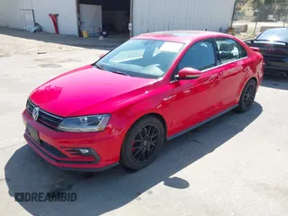 2017 Volkswagen Jetta GLI z VIN 3VW4T7AJ3HM350575, wystawiony jako IAAI lot #42303994 z przebiegiem 168 622 mil mil oraz . Historia ofert i sprzedaży dostępna na DreamBid. Obrazek 18.