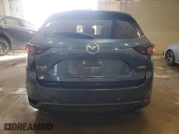 2020 Mazda CX-5 Touring with VIN JM3KFBCM2L0853447, listed as a Copart auction lot 54621675 with 88,649 mi miles and Non Repairable. Bid and sale history available at carsss.com. Image 6.