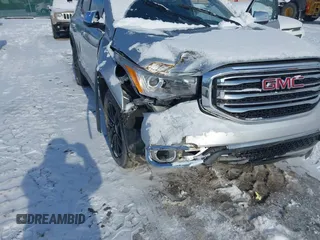 2019 GMC Acadia SLT z VIN 1GKKNULS7KZ170471, wystawiony jako IAAI lot #41499589 z przebiegiem 142 064 mil mil oraz . Historia ofert i sprzedaży dostępna na DreamBid. Obrazek 6.