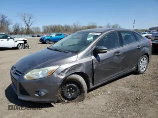 2012 Ford Focus SE with VIN 1FAHP3F23CL243982, listed as a Copart auction lot 52801055 with 143,695 mi miles and Salvage Title. Bid and sale history available at carsss.com. Image 1.