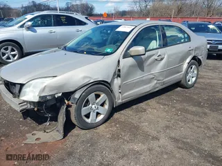 2006 Ford Fusion SE with VIN 3FAFP07176R240651, listed as a IAAI auction lot 41867045 with 164,455 mi miles. Bid and sale history available at carsss.com. Image 6.