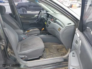 2003 Mitsubishi Lancer ES with VIN JA3AJ26E83U015342, listed as a IAAI auction lot 41819617 with 355,658 mi miles. Bid and sale history available at carsss.com. Image 5.
