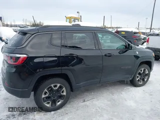 2018 Jeep Compass Trailhawk with VIN 3C4NJDDB3JT450932, listed as a IAAI auction lot 41616316 with 107,198 mi miles and . Bid and sale history available at DreamBid. Image 13.