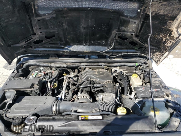 2015 Jeep Wrangler Unlimited Rubicon Hard Rock with VIN 1C4HJWFG1FL710264, listed as a Copart auction lot 47563975 with 96,737 mi miles and Salvage title. Bid and sale history available at DreamBid. Image 12.