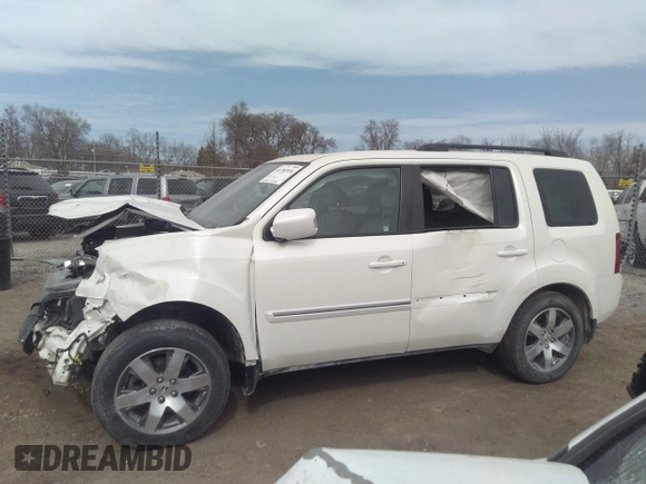 2015 Honda Pilot Touring with VIN 5FNYF4H9XFB047607, listed as a IAAI auction lot 41781534 with 157,252 mi miles. Bid and sale history available at carsss.com. Image 14.