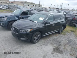 2020 Infiniti QX60 Pure with VIN 5N1DL0MN5LC525763, listed as a IAAI auction lot 41259100 with 38,995 mi miles and . Bid and sale history available at DreamBid. Image 2.