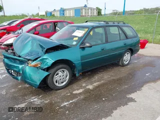 1997 Ford Escort LX with VIN 3FALP15P1VR169817, listed as a IAAI auction lot 42094673 with 111,762 mi miles. Bid and sale history available at carsss.com. Image 17.
