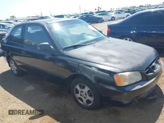 2001 Hyundai Accent GL z VIN KMHCG35C01U114597, wystawiony jako IAAI lot #42163745 z przebiegiem 203 310 mil mil oraz . Historia ofert i sprzedaży dostępna na DreamBid. Obrazek 1.
