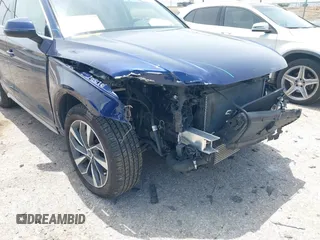 2021 Audi Q5 Premium with VIN WA1AAAFY7M2004975, listed as a IAAI auction lot 42190283 with 56,810 mi miles and . Bid and sale history available at DreamBid. Image 17.