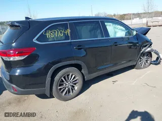 2019 Toyota Highlander SE with VIN 5TDJZRFH0KS711578, listed as a IAAI auction lot 41877044 with 77,193 mi miles. Bid and sale history available at carsss.com. Image 4.