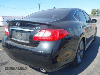2011 Infiniti M with VIN JN1BY1AP1BM324835, listed as a IAAI auction lot 42592066 with 208,124 mi miles and . Bid and sale history available at DreamBid. Image 4.