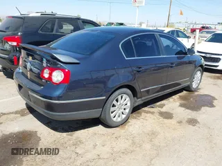 2008 Volkswagen Passat Komfort z VIN WVWJK73C28E241263, wystawiony jako IAAI lot #42021388 z przebiegiem 144 131 mil mil oraz . Historia ofert i sprzedaży dostępna na DreamBid. Obrazek 4.