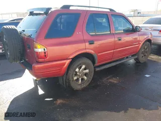 1999 Isuzu Rodeo S with VIN 4S2CK58W3X4307201, listed as a IAAI auction lot 41884901 with 236,970 mi miles. Bid and sale history available at carsss.com. Image 4.