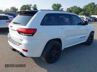 2016 Jeep Grand Cherokee SRT with VIN 1C4RJFDJ3GC503878, listed as a IAAI auction lot 42830257 with 82,661 mi miles and . Bid and sale history available at DreamBid. Image 4.