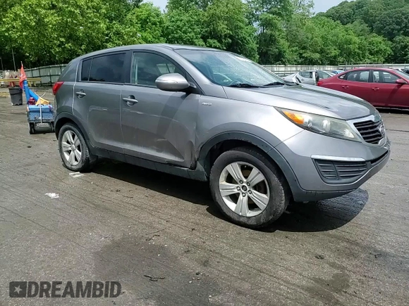 2012 Kia Sportage LX z VIN KNDPBCA24C7263100, wystawiony jako Copart lot #59538495 z przebiegiem 212 750 mil mil oraz Szkoda całkowita • Salvage title. Historia ofert i sprzedaży dostępna na DreamBid. Obrazek 14.