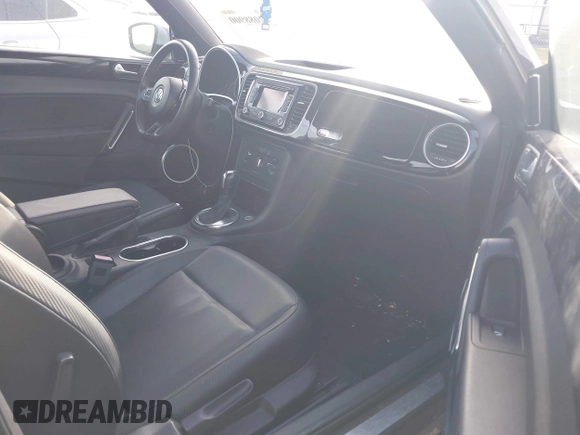 2013 Volkswagen Beetle 2.5L with VIN 3VWJP7AT1DM608370, listed as a IAAI auction lot 42088900 with Not Provided miles and . Bid and sale history available at DreamBid. Image 5.