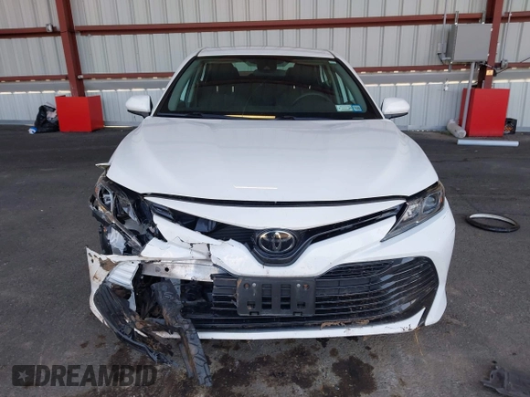 2020 Toyota Camry LE with VIN 4T1C11AK9LU935025, listed as a IAAI auction lot 42054033 with 63,814 mi miles and . Bid and sale history available at carsss.com. Image 12.