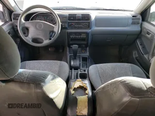 2002 Isuzu Rodeo S with VIN 4S2CK58W324314240, listed as a Copart auction lot 43694015 with 132,212 mi miles and Salvage title. Bid and sale history available at DreamBid. Image 8.