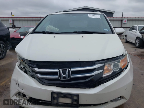2016 Honda Odyssey Touring Elite with VIN 5FNRL5H9XGB100116, listed as a IAAI auction lot 41543464 with 160,763 mi miles and . Bid and sale history available at DreamBid. Image 12.