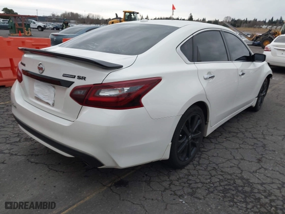 2018 Nissan Altima 2.5 SV with VIN 1N4AL3AP4JC158095, listed as a IAAI auction lot 41155838 with 79,504 mi miles. Bid and sale history available at carsss.com. Image 4.