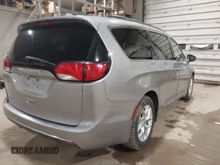 2017 Chrysler Pacifica Touring L with VIN 2C4RC1BG7HR831320, listed as a IAAI auction lot 41805697 with 137,743 mi miles and . Bid and sale history available at DreamBid. Image 4.