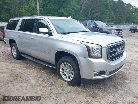 2019 GMC Yukon XL SLT z VIN 1GKS1GKC0KR242408, wystawiony jako IAAI lot #42144783 z przebiegiem Nie podano mil oraz . Historia ofert i sprzedaży dostępna na DreamBid. Obrazek 1.