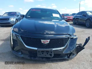 2025 Cadillac CT5 Sport с VIN 1G6DP5RK3S0100470, выставлен на аукционе IAAI как лот 42386329 с пробегом 6 143 миль миль и . История ставок и продаж доступна на DreamBid. Изображение 13.