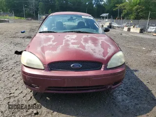 2005 Ford Taurus SE z VIN 1FAFP53U35A106807, wystawiony jako Copart lot #57023025 z przebiegiem 168 727 mil mil oraz Szkoda całkowita • Salvage title. Historia ofert i sprzedaży dostępna na DreamBid. Obrazek 5.
