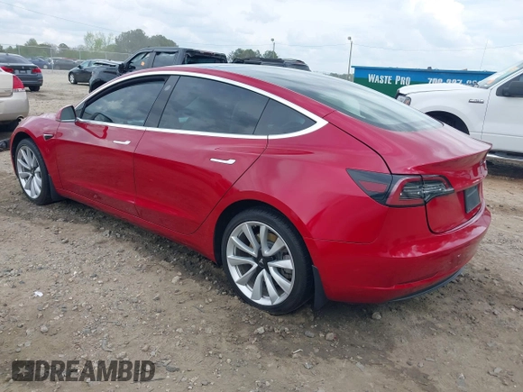 2019 Tesla Model 3 Mid Range z VIN 5YJ3E1EA7KF445040, wystawiony jako IAAI lot #41954956 z przebiegiem 68 004 mil mil oraz . Historia ofert i sprzedaży dostępna na DreamBid. Obrazek 3.