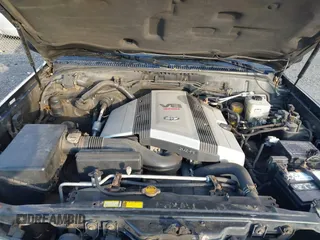 2000 Toyota Land Cruiser with VIN JT3HT05J7Y0110667, listed as a IAAI auction lot 41248220 with 208,043 mi miles. Bid and sale history available at carsss.com. Image 10.