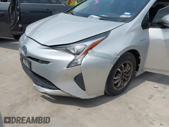 2016 Toyota Prius Four z VIN JTDKARFU5G3008768, wystawiony jako IAAI lot #42125504 z przebiegiem 164 229 mil mil oraz . Historia ofert i sprzedaży dostępna na DreamBid. Obrazek 6.