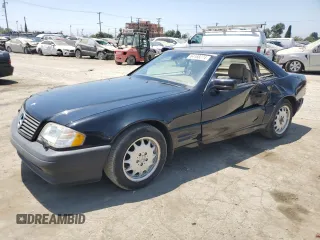 1998 Mercedes-Benz SL-Class with VIN WDBFA67F8WF158109, listed as a Copart auction lot 64188274 with 72,050 mi miles and Salvage Title. Bid and sale history available at carsss.com. Image 1.