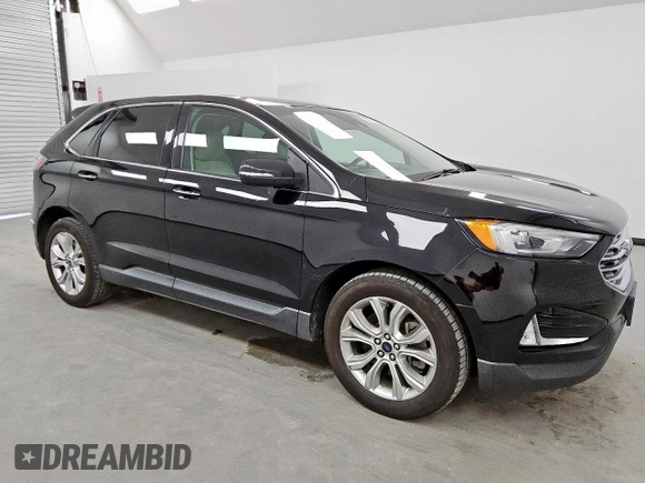2021 Ford Edge Titanium с VIN 2FMPK4K94MBA27083, выставлен на аукционе Copart как лот 62149285 с пробегом 128 325 миль миль и Чистый • Clean title. История ставок и продаж доступна на DreamBid. Изображение 4.