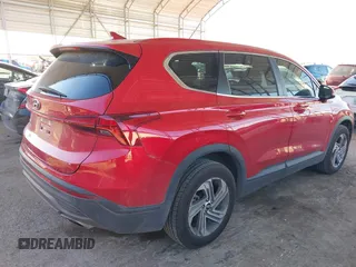 2021 Hyundai Santa Fe SE with VIN 5NMS14AJ5MH311823, listed as a IAAI auction lot 41301373 with 70,379 mi miles. Bid and sale history available at carsss.com. Image 4.
