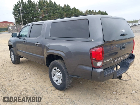 2022 Toyota Tacoma SR with VIN 3TYCZ5AN3NT078324, listed as a IAAI auction lot 42007132 with 35,802 mi miles and . Bid and sale history available at DreamBid. Image 3.