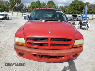2002 Dodge Dakota z VIN 1B7FL36X72S543943, wystawiony jako Copart lot #80767984 z przebiegiem Nie podano mil oraz Czysty tytuł • Clean title. Historia ofert i sprzedaży dostępna na DreamBid. Obrazek 5.
