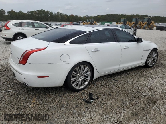 2013 Jaguar XJ with VIN SAJWA2GB8DLV52975, listed as a Copart auction lot 79123644 with 160,473 mi miles and Salvage Title. Bid and sale history available at carsss.com. Image 3.