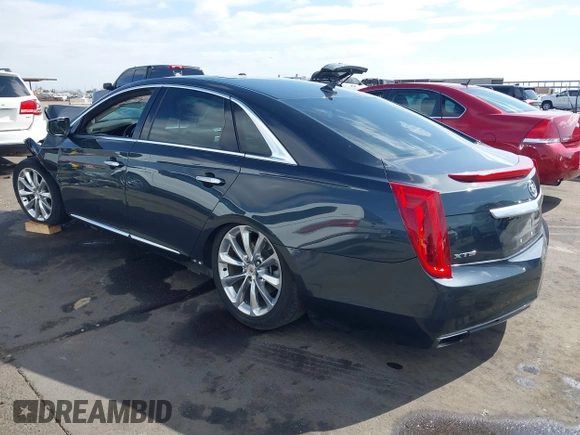 2013 Cadillac XTS Luxury with VIN 2G61P5S31D9182553, listed as a IAAI auction lot 42076227 with 116,849 mi miles and . Bid and sale history available at DreamBid. Image 3.