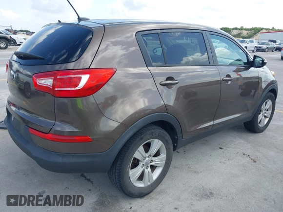 2013 Kia Sportage LX with VIN KNDPB3A28D7375304, listed as a IAAI auction lot 42566081 with 17,890 mi miles and . Bid and sale history available at DreamBid. Image 4.