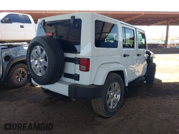 2016 Jeep Wrangler Unlimited Sahara with VIN 1C4BJWEG0GL126270, listed as a IAAI auction lot 42229364 with 50,847 mi miles and . Bid and sale history available at DreamBid. Image 4.