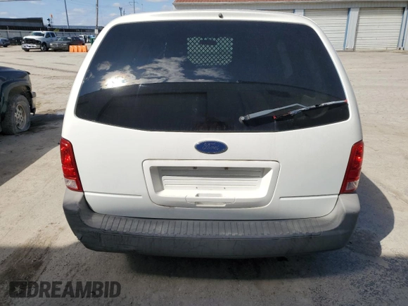 2007 Ford Freestar Cargo z VIN 2FTZA54647BA13617, wystawiony jako Copart lot #52545745 z przebiegiem Nie podano mil oraz Szkody całkowita. Historia ofert i sprzedaży dostępna na DreamBid. Obrazek 6.