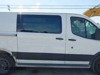 2019 Ford Transit with VIN 1FTYR1YM2KKB01764, listed as a IAAI auction lot 42216591 with 193,653 mi miles and . Bid and sale history available at DreamBid. Image 13.