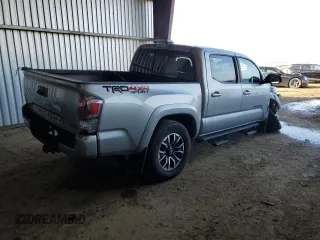 2021 Toyota Tacoma SR with VIN 3TMCZ5AN6MM393306, listed as a Copart auction lot 41483325 with 57,217 mi miles and Salvage title. Bid and sale history available at DreamBid. Image 3.