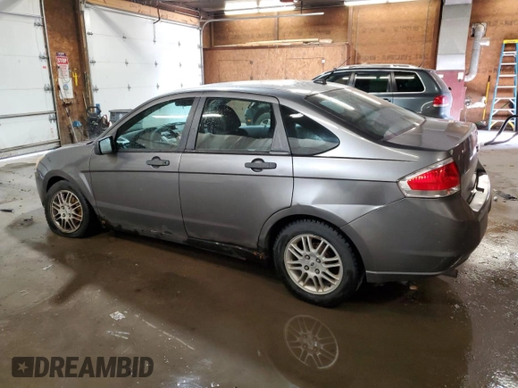 2010 Ford Focus SE with VIN 1FAHP3FN1AW146737, listed as a Copart auction lot 76261654 with 140,988 mi miles and Salvage Title. Bid and sale history available at DreamBid. Image 2.