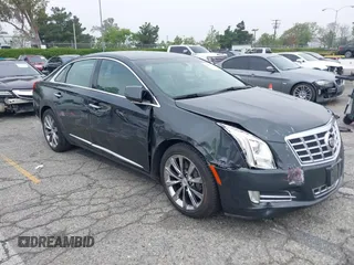 2013 Cadillac XTS Luxury with VIN 2G61P5S33D9215214, listed as a IAAI auction lot 42170402 with 132,045 mi miles and . Bid and sale history available at DreamBid. Image 6.