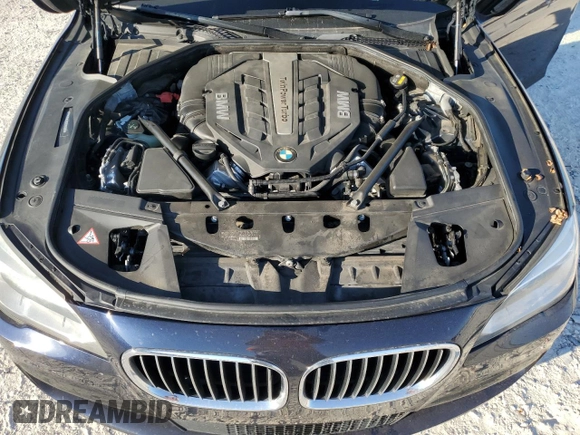 2015 BMW 7 Series 750Li with VIN WBAYE8C59FD781318, listed as a Copart auction lot 74053154 with 62,681 mi miles and Salvage Title. Bid and sale history available at carsss.com. Image 12.